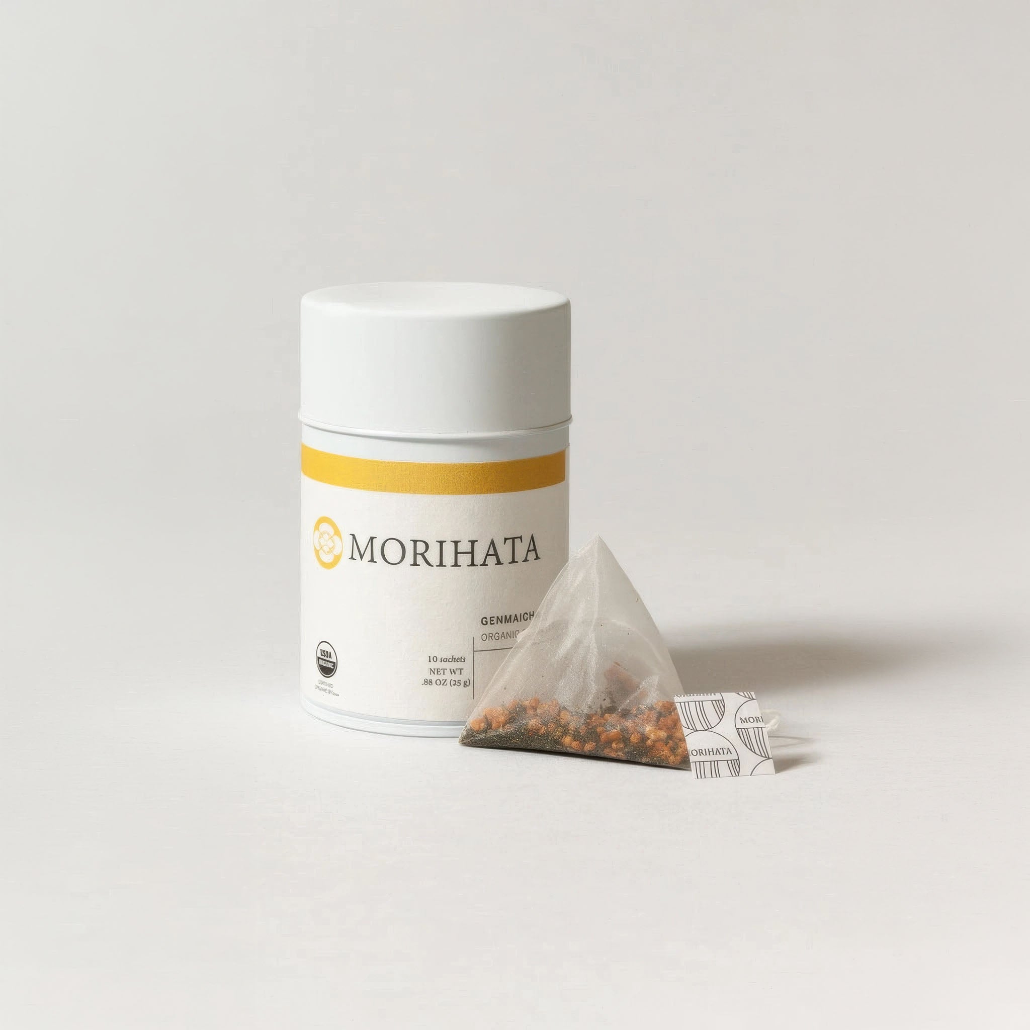 Morihata genmaicha tea packaging with a pyramid-shaped tea bag on a light background