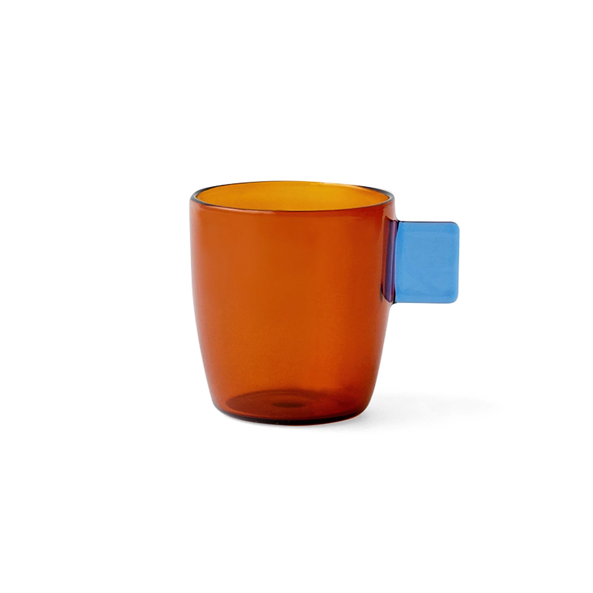 Amber demitasse glass mug with a blue handle on a white background