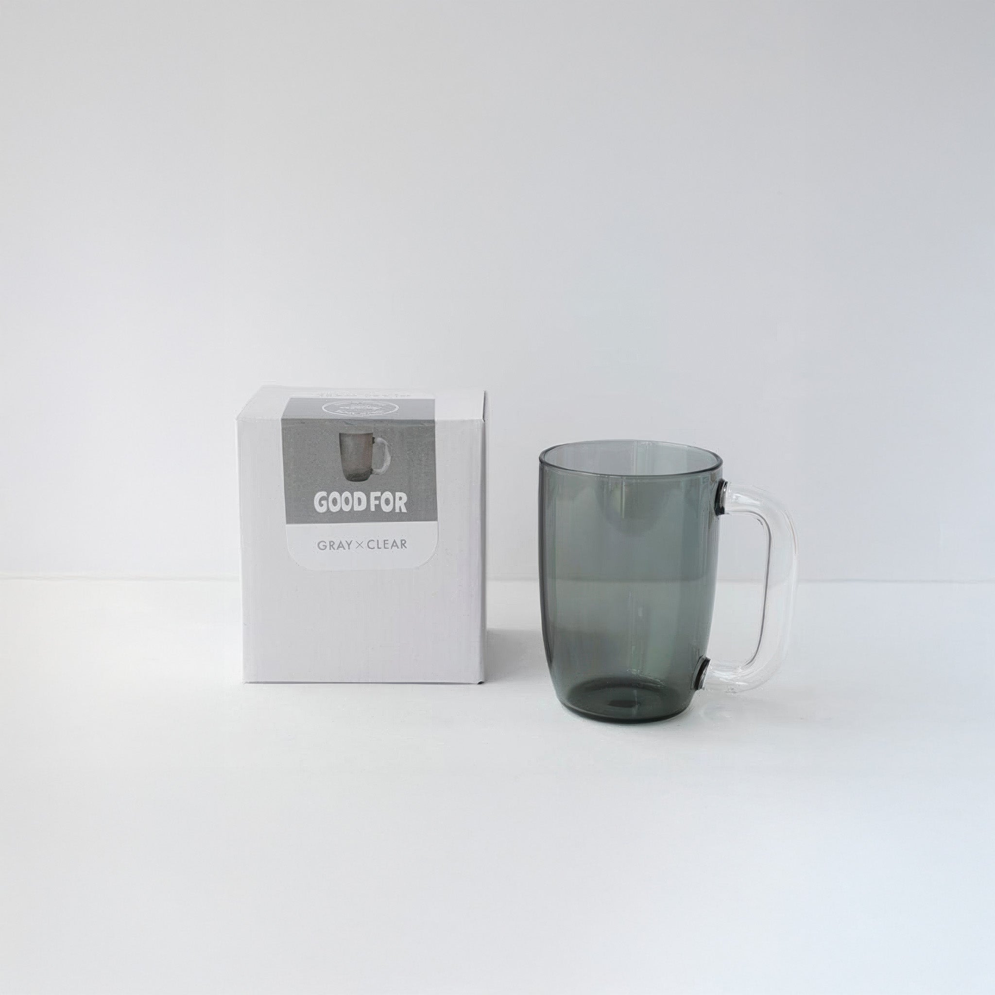 Gray mug with a matching box labeled 'GOOD FOR' on a white background