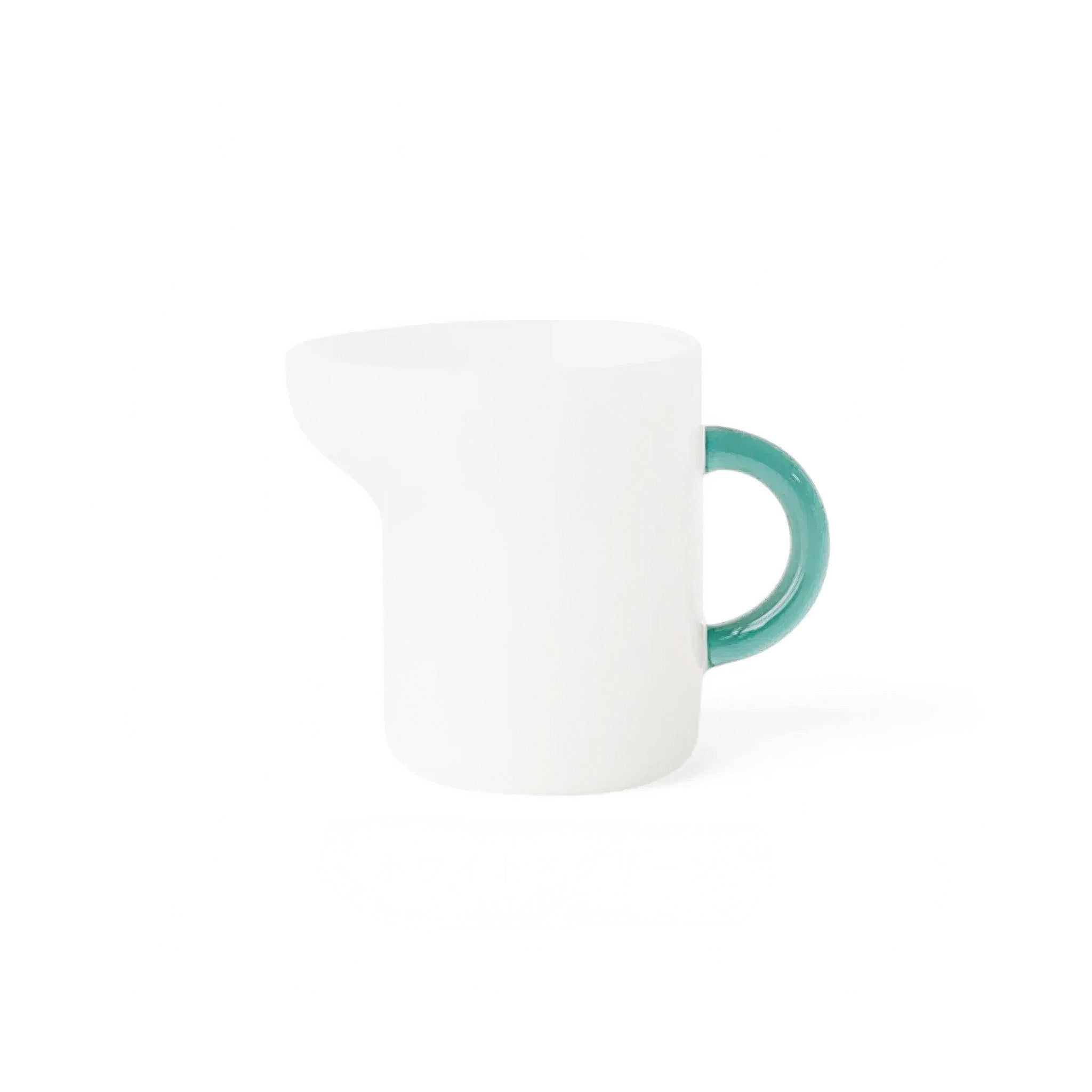 White glass mini pitcher on a white background