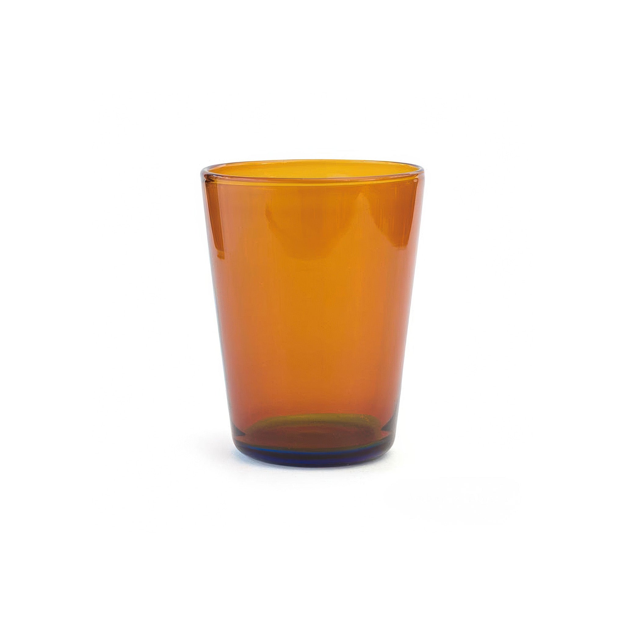 Two tone amber glass tumbler on a white background