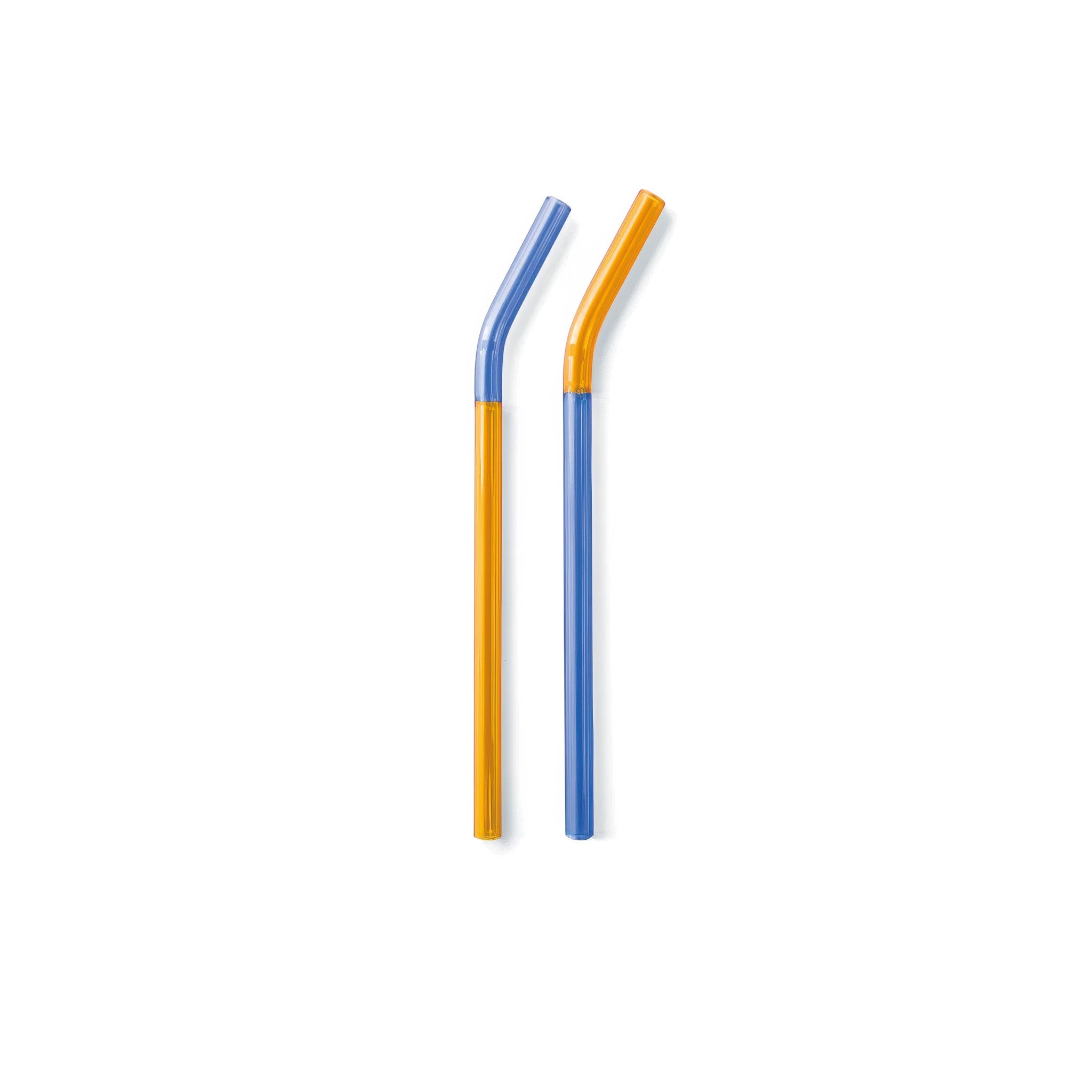 Two toned amber x blue glass straws on a white background