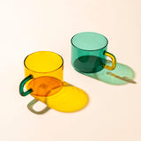The Tropicana Chá Mug Set on a light beige background.