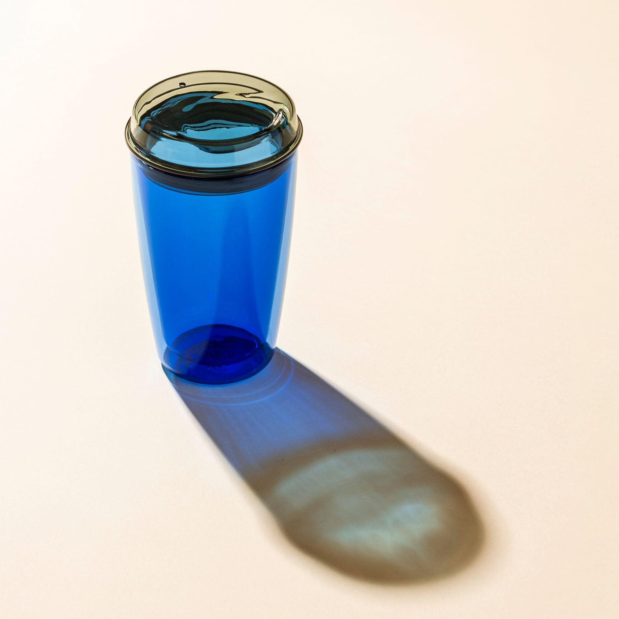 Cuddle Cup Midnight on a beige background