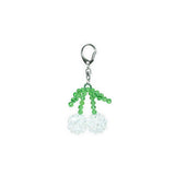 Green and white clear beaded keychain with a silver clasp on a white background