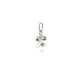 Silver charm with clear beads on a white background