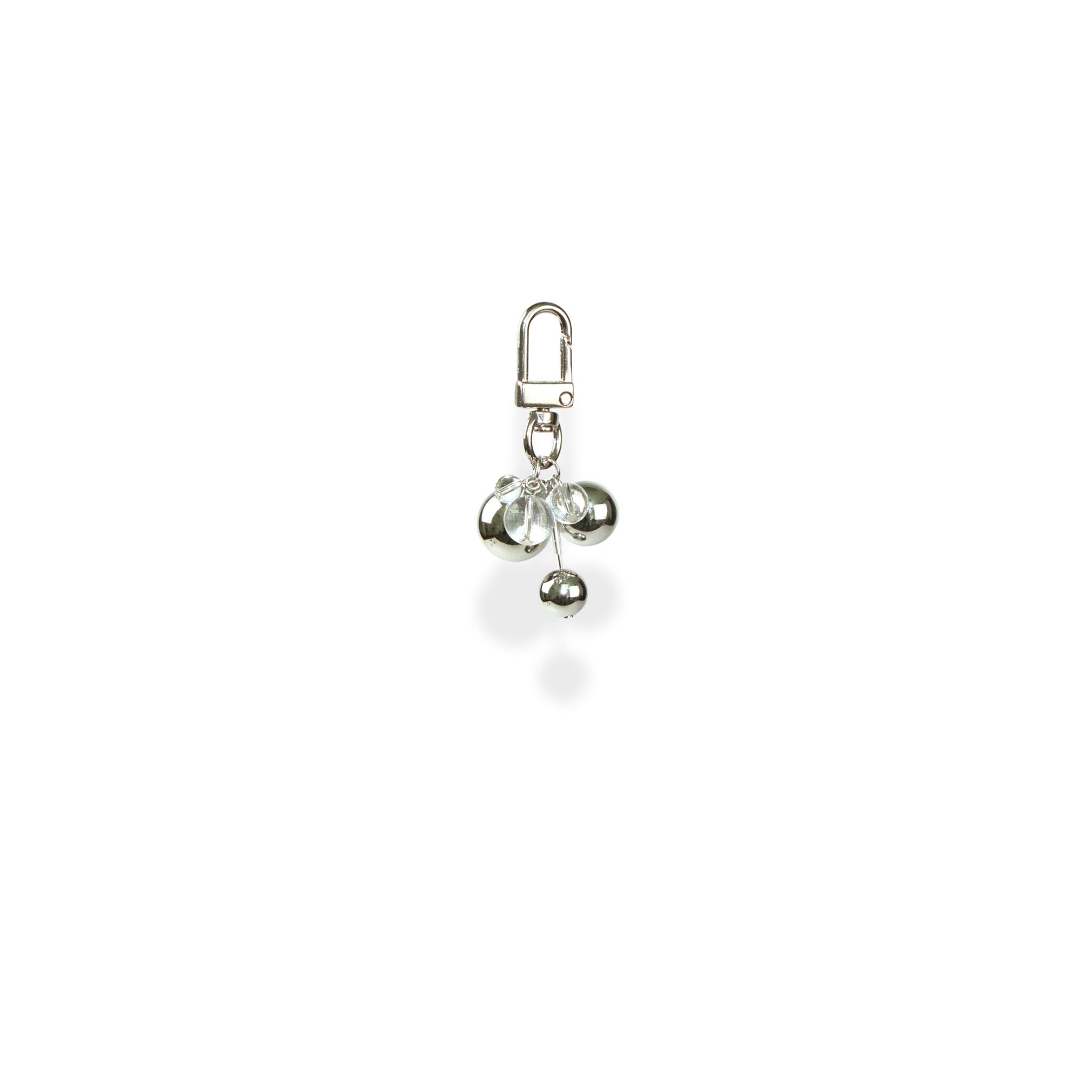 Silver charm with clear beads on a white background
