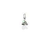 Silver charm with a green bead on a white background