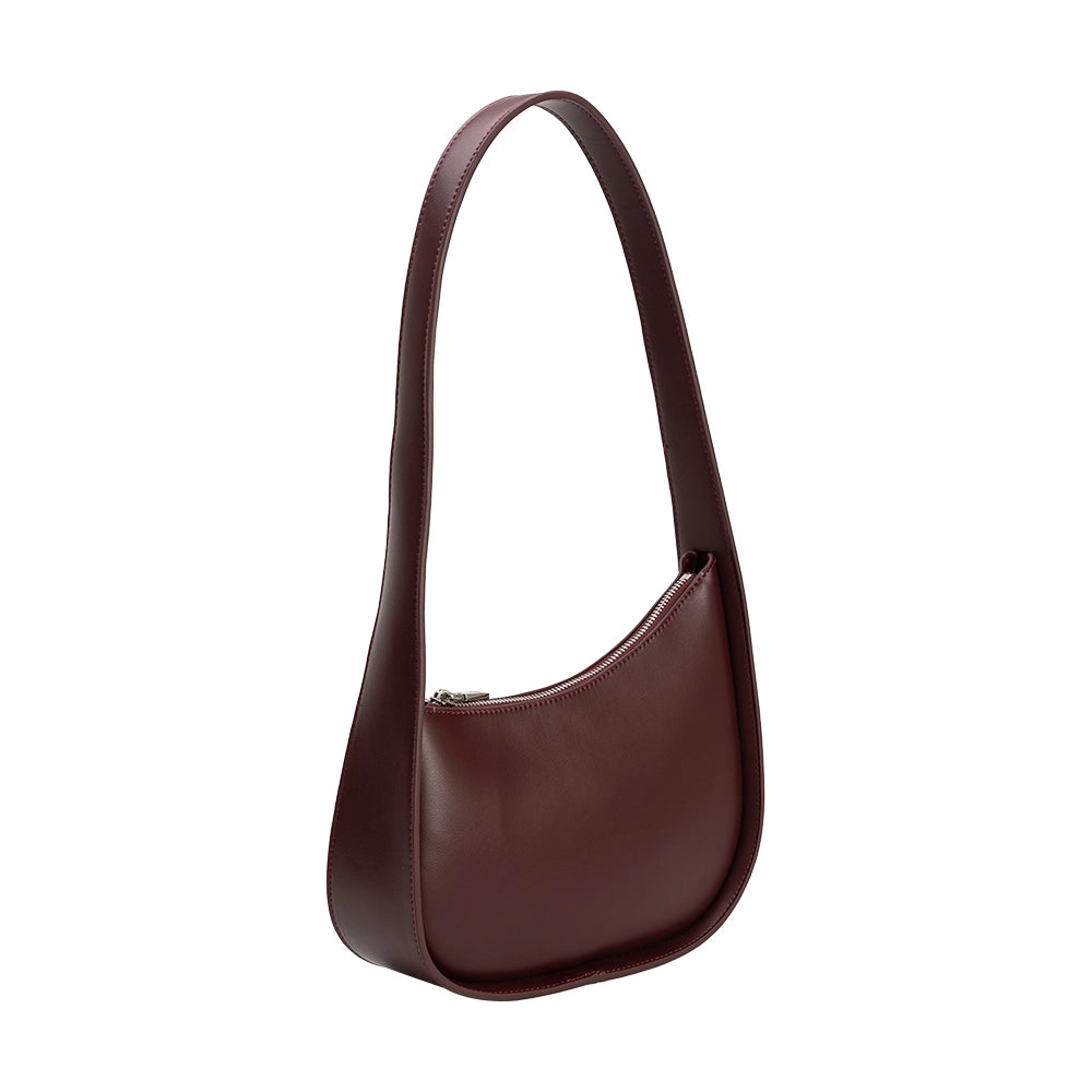 Angled view of the Willow recycled vegan shoulder bag in plum