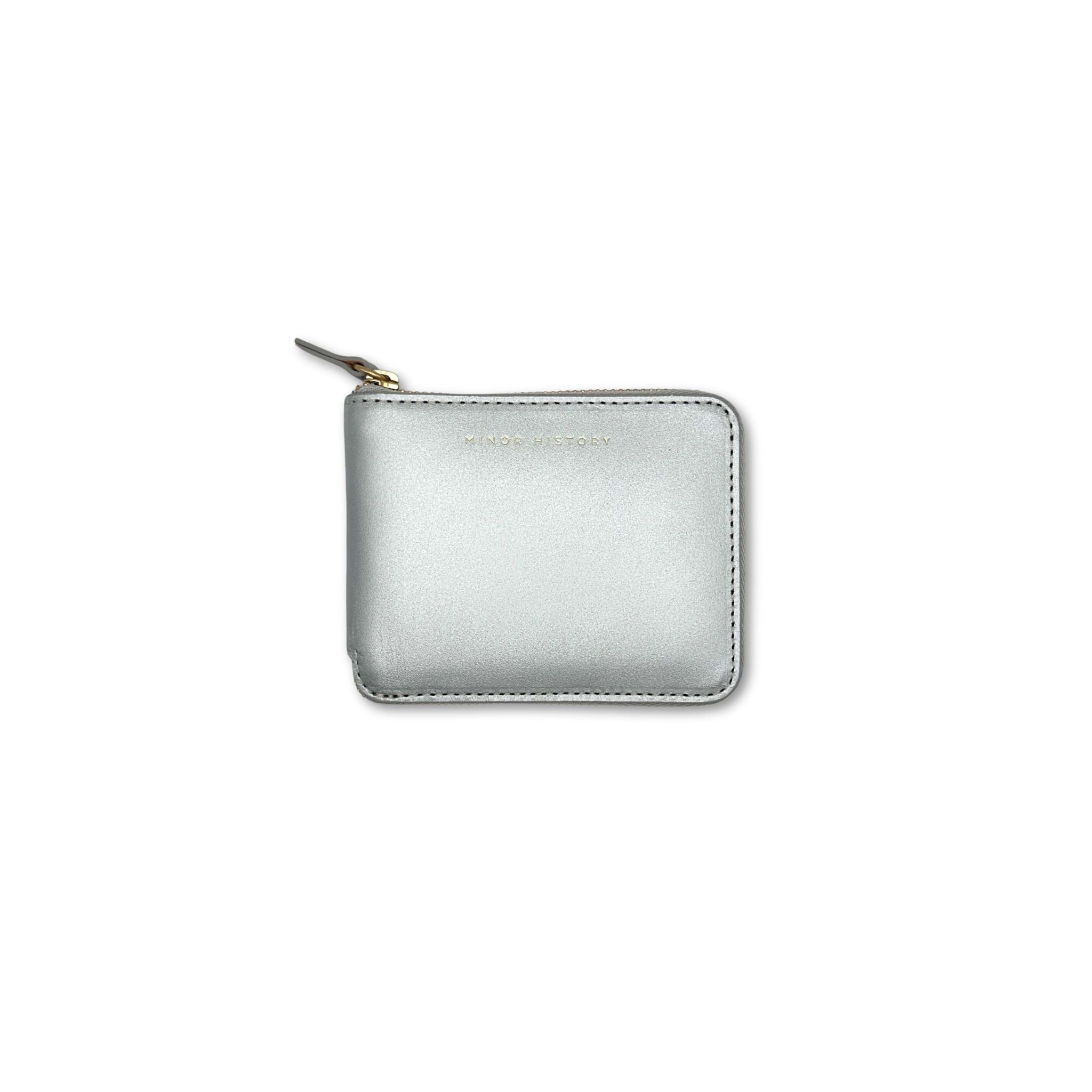 Front view of Minor History's coupe wallet in sterling