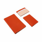 image of moma recycled leather color design goods including a passport holder 