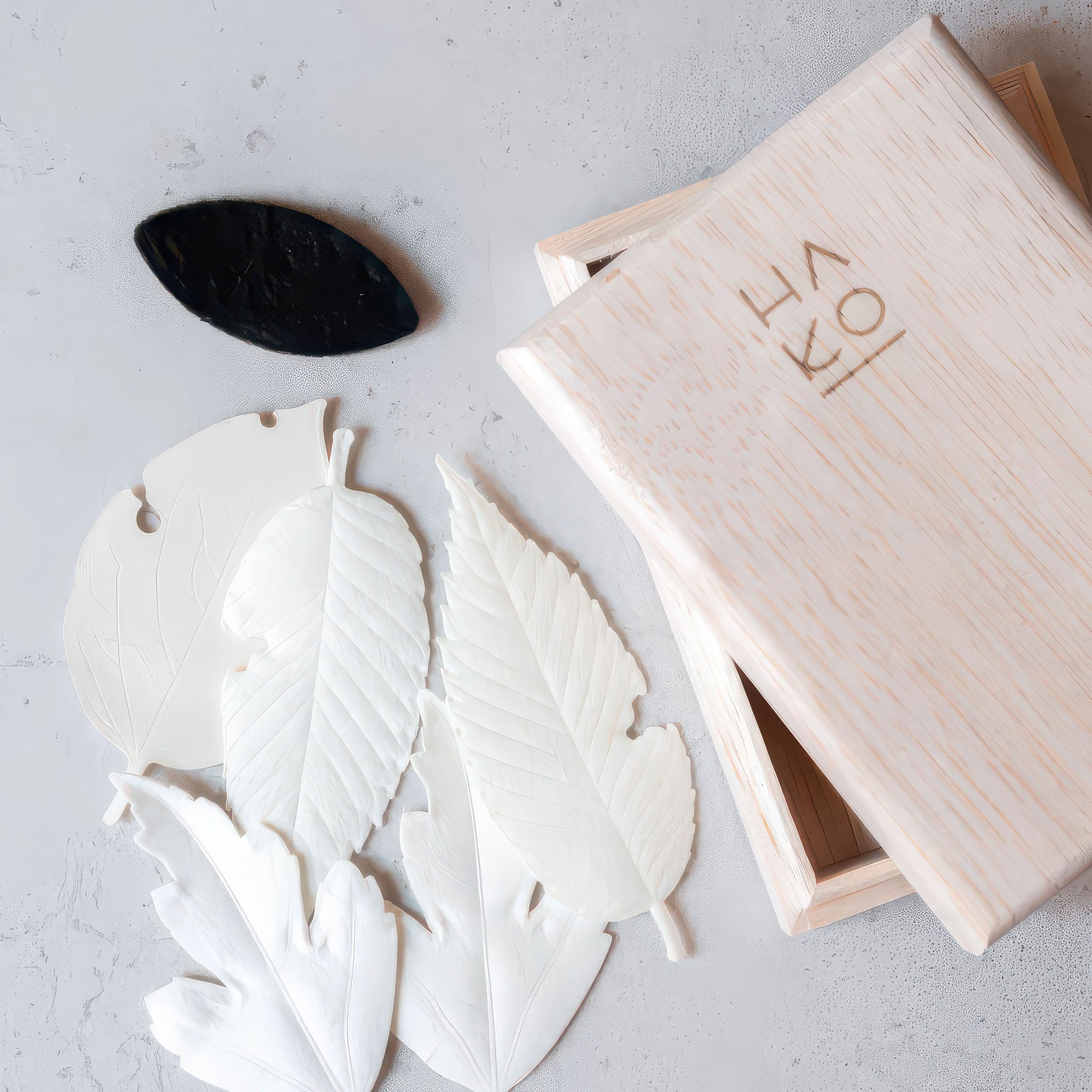 image of morihata hako incense kit with open wooden box and leaf shaped incense