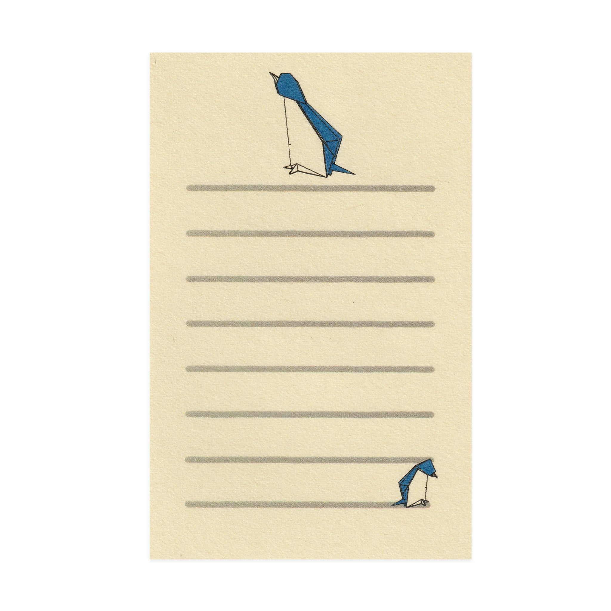 Letterset with blue penguin illustrations on a beige background