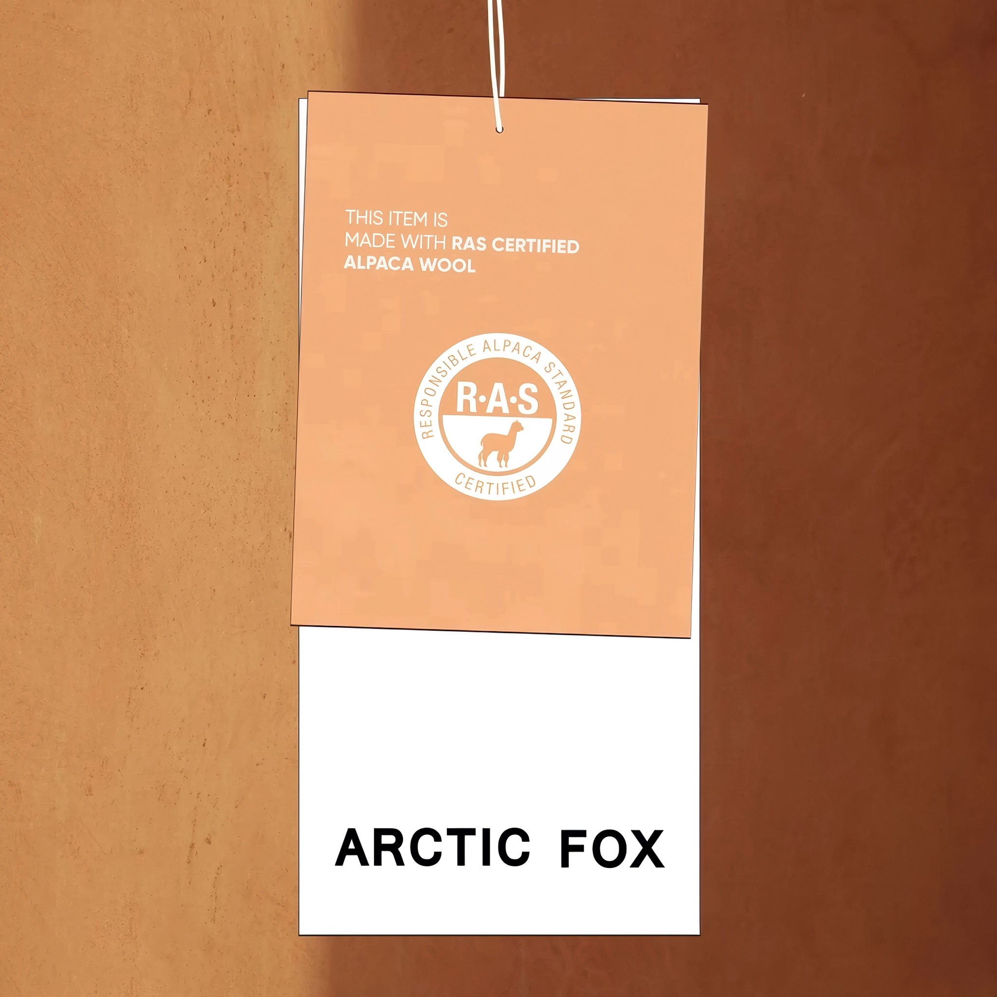 Product tag with 'RAS Certified' label and 'Arctic Fox' text on a brown background