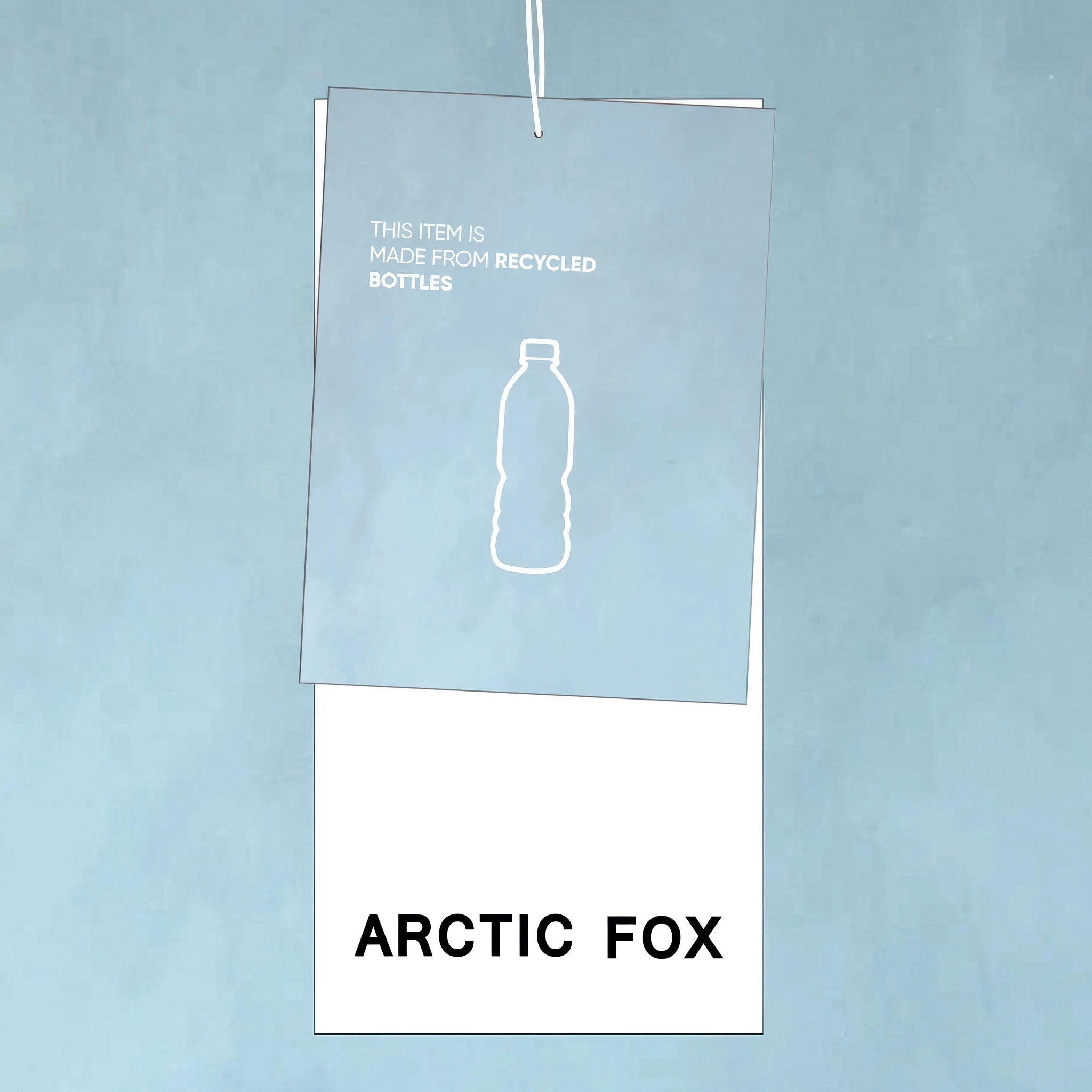 Product tag with 'Arctic Fox' branding and recycled bottle information on a light blue background