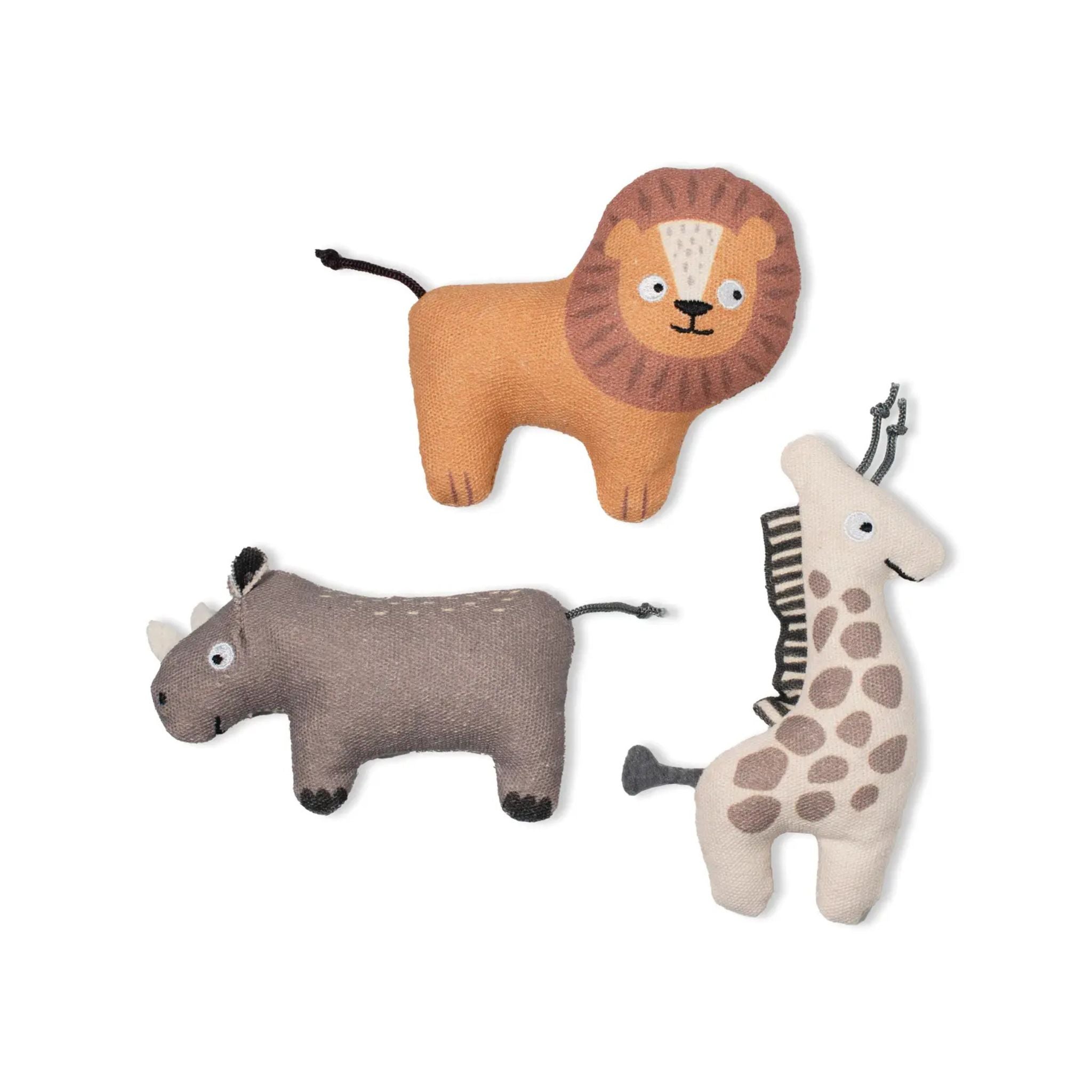 Three plush dog toys shaped like a lion, rhino, and giraffe on a white background