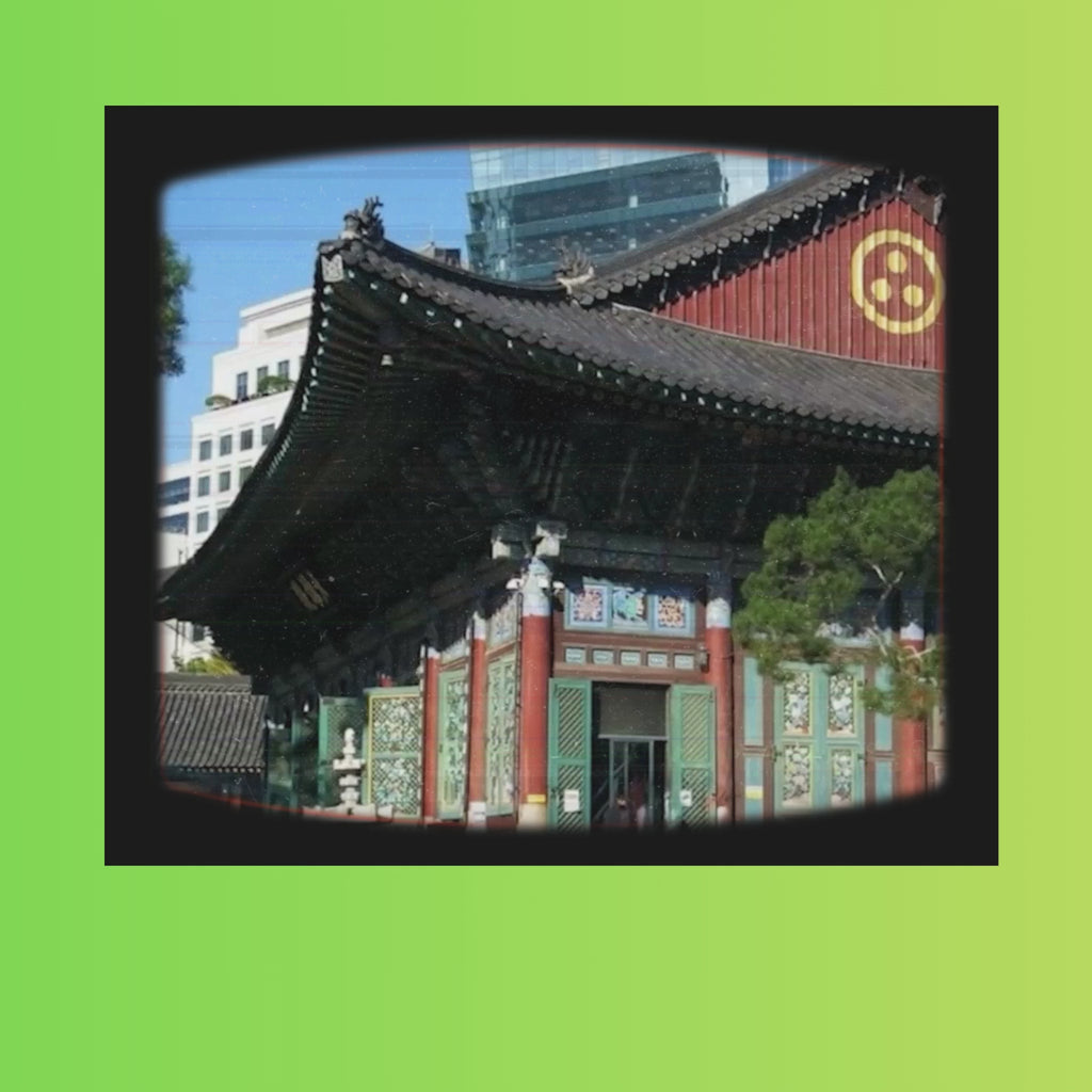 Doc-style video showing the making of temple lotus paper lanterns, with scenes from Jeogyesa Temple in Seoul and close-ups of a hand-assembled lotus lantern on a green ombré background.