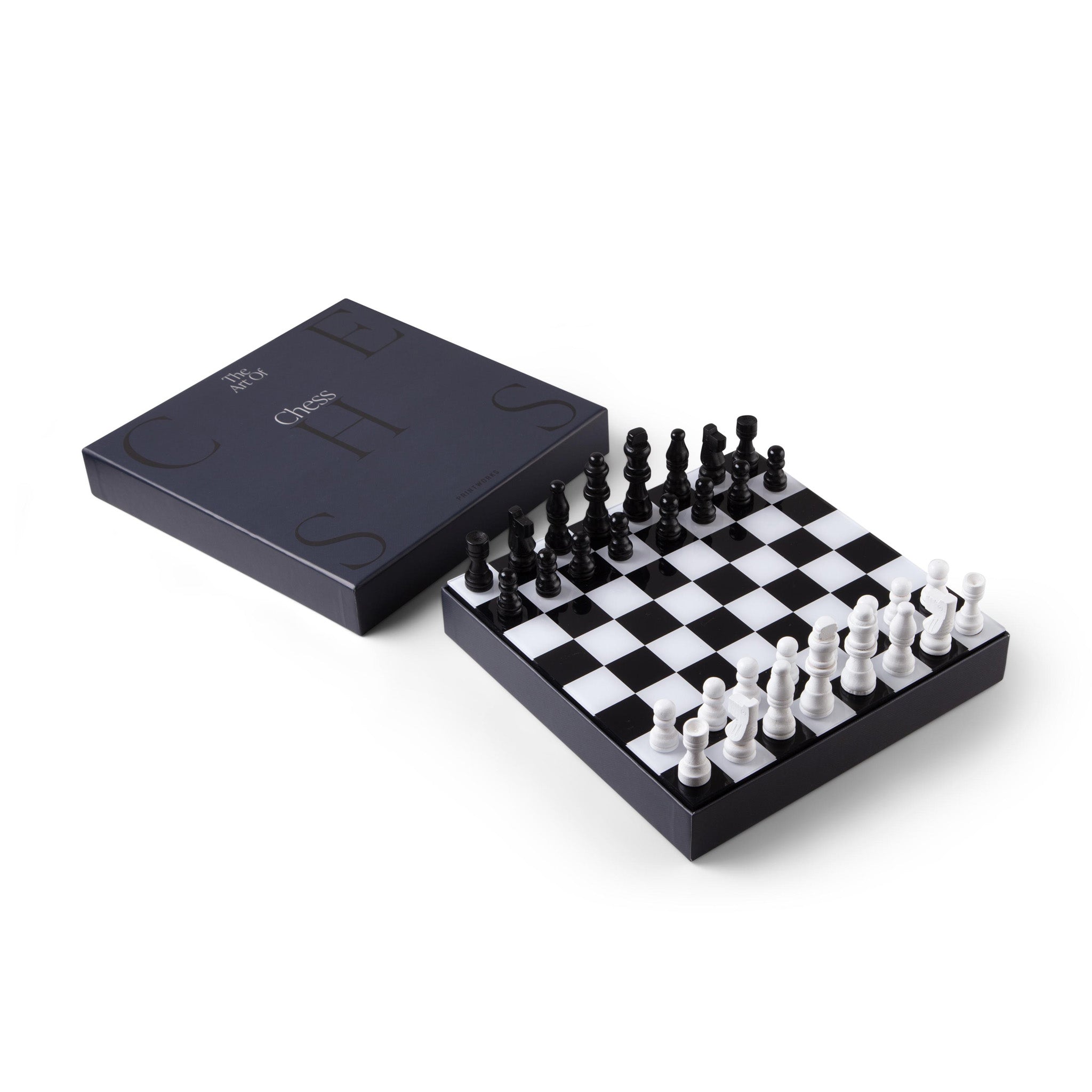 image from above of printworks classic chess set in black and white color with chess pieces and box 