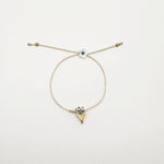 image of river song bracelet with golden heart tiny treasure design