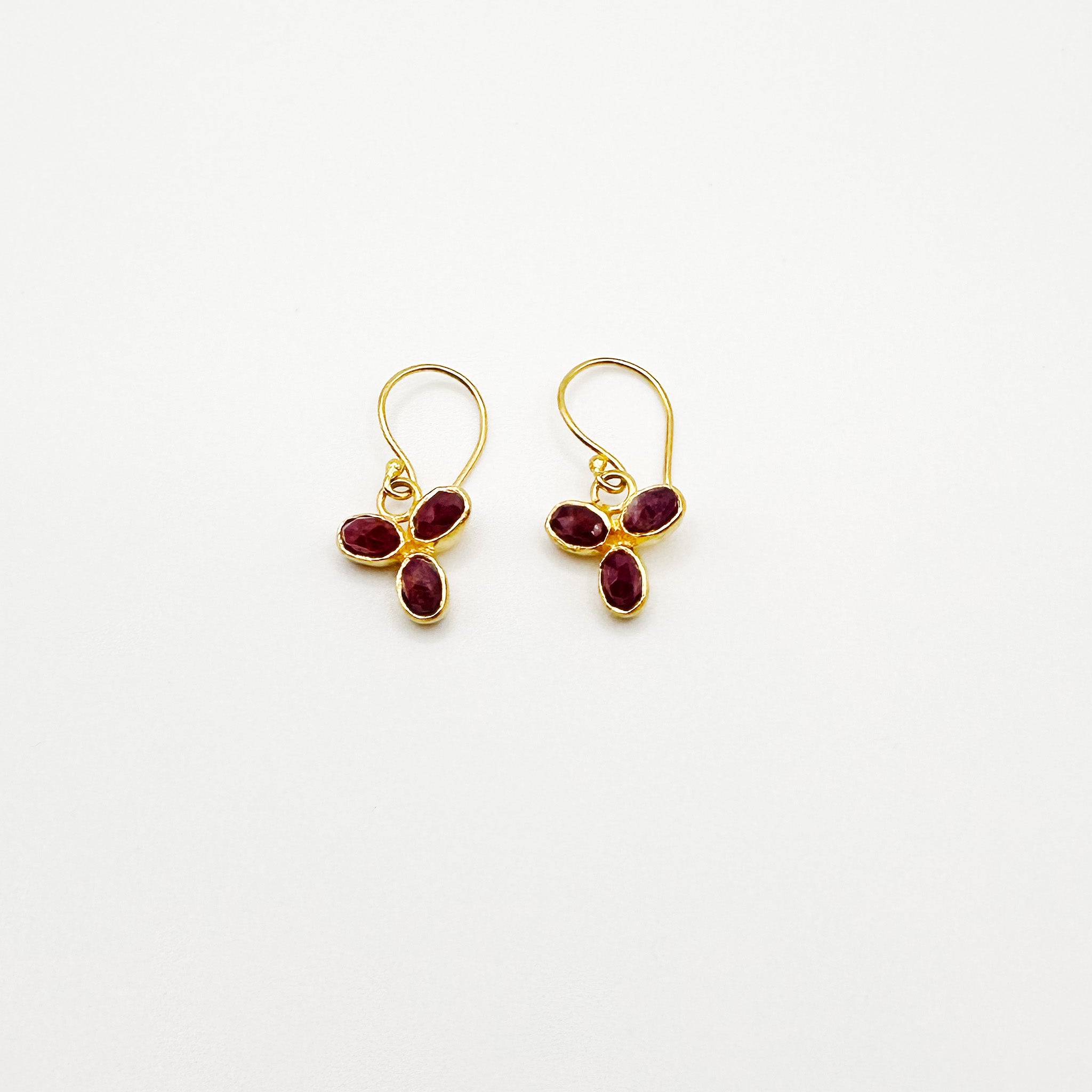 image of two river song earrings florets ruby color