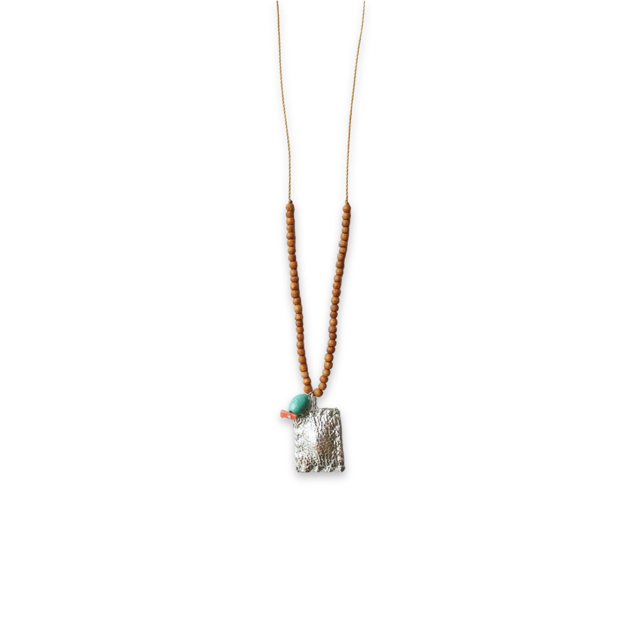 close up image of see real flowers necklace trinket silver color