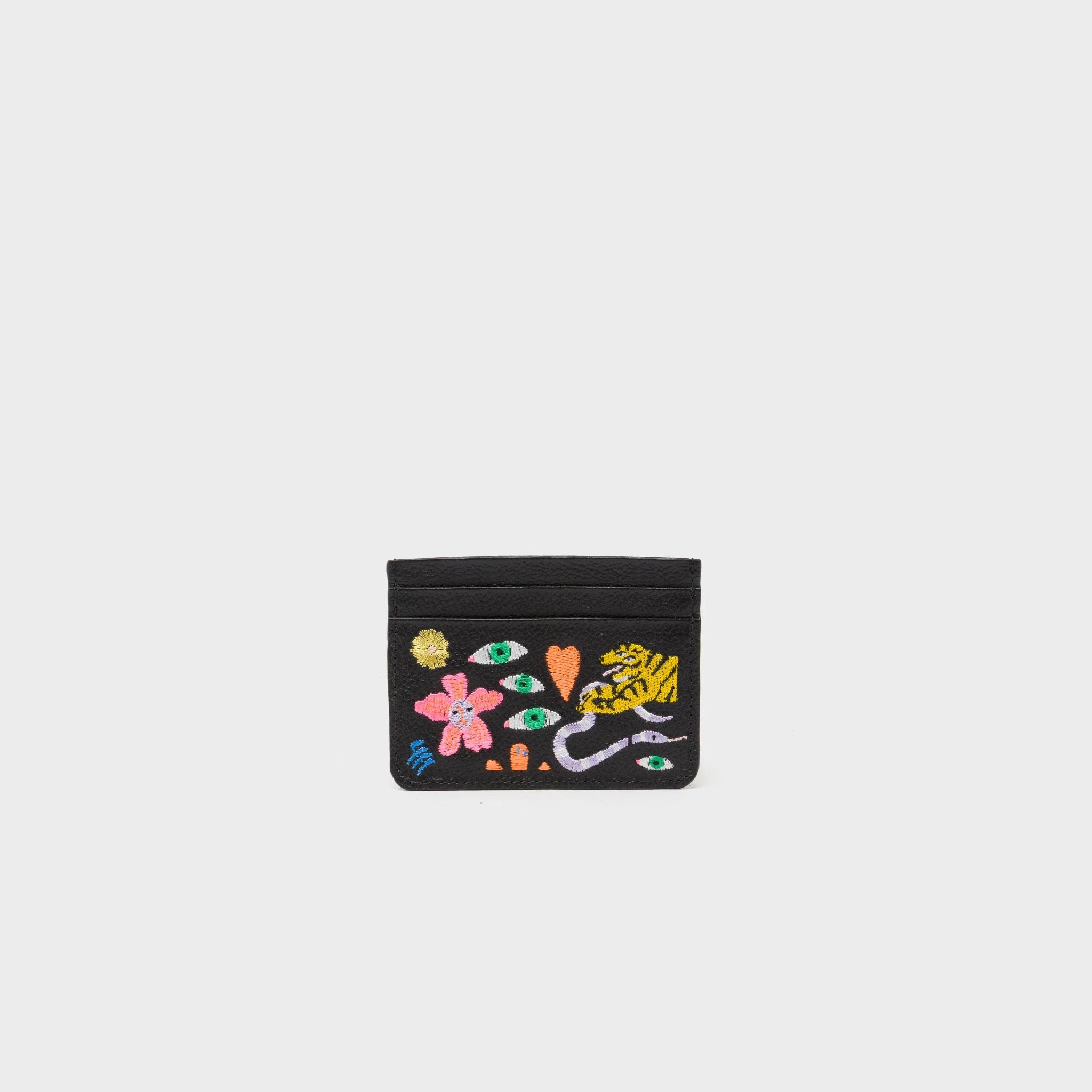 Black cardholder with colorful embroidered designs on a white background