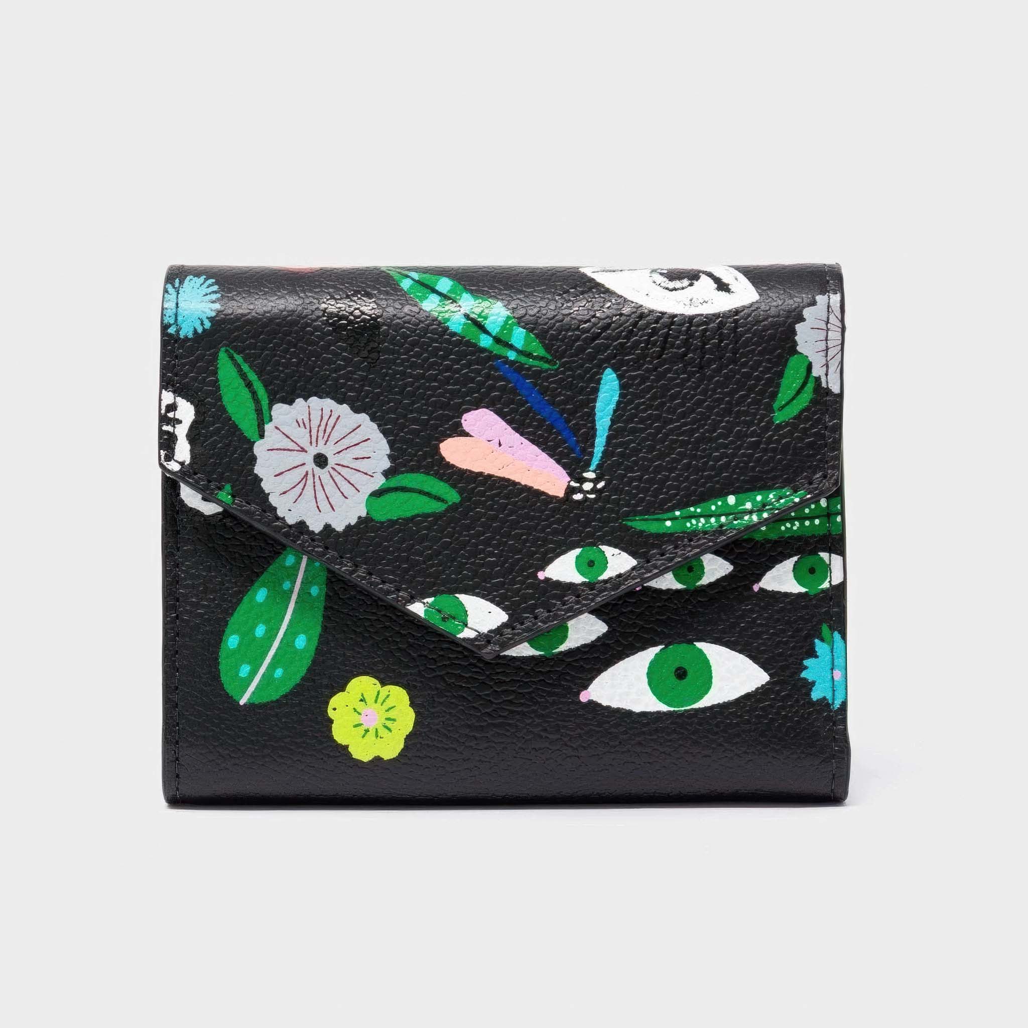 Black wallet with colorful floral and eye pattern on a white background