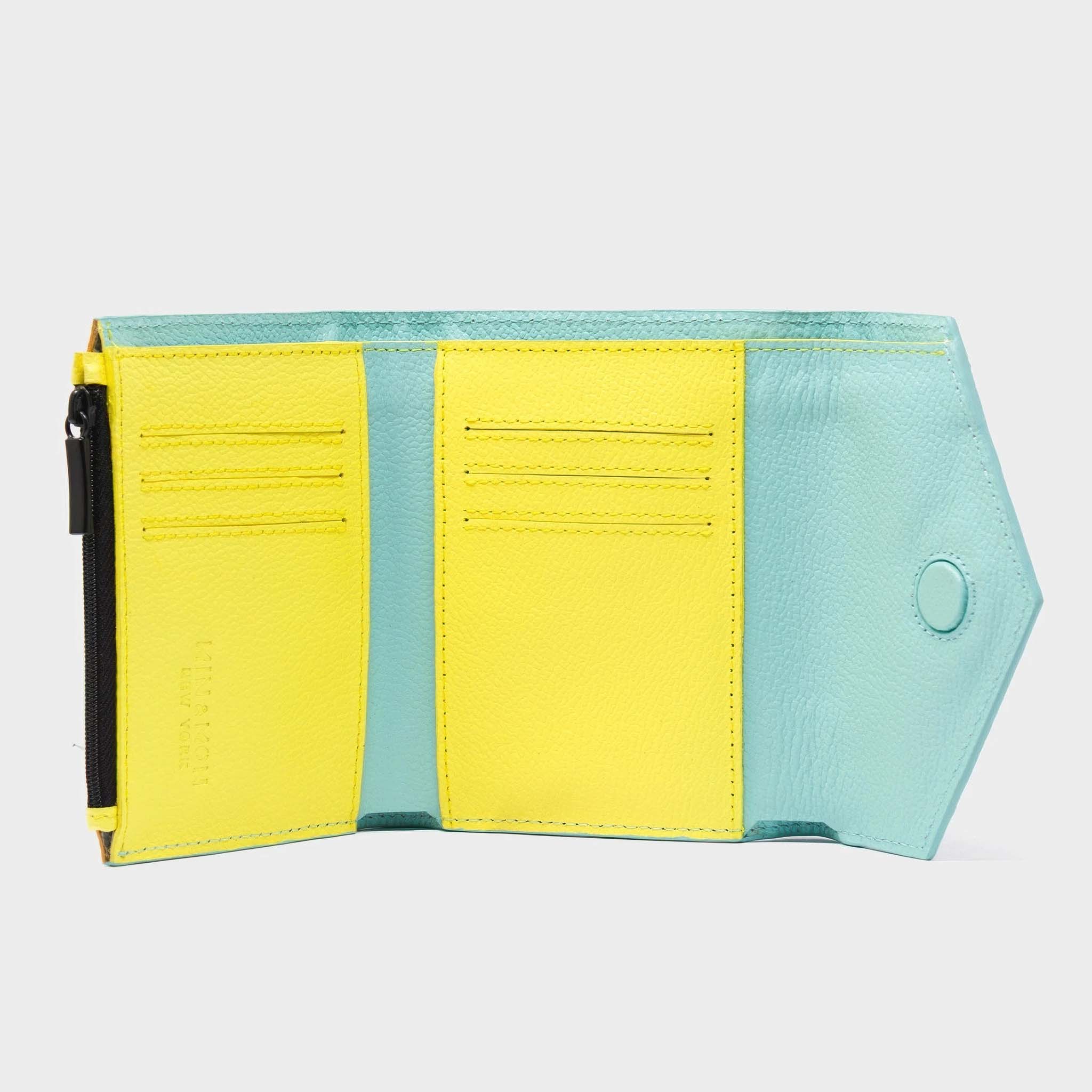 Two-tone yellow and light blue interior of a wallet on a white background