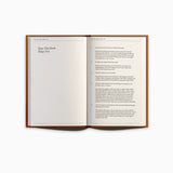 Open spread of Build A Habit Journal by Therapy Notebooks, showing How This Book Helps You