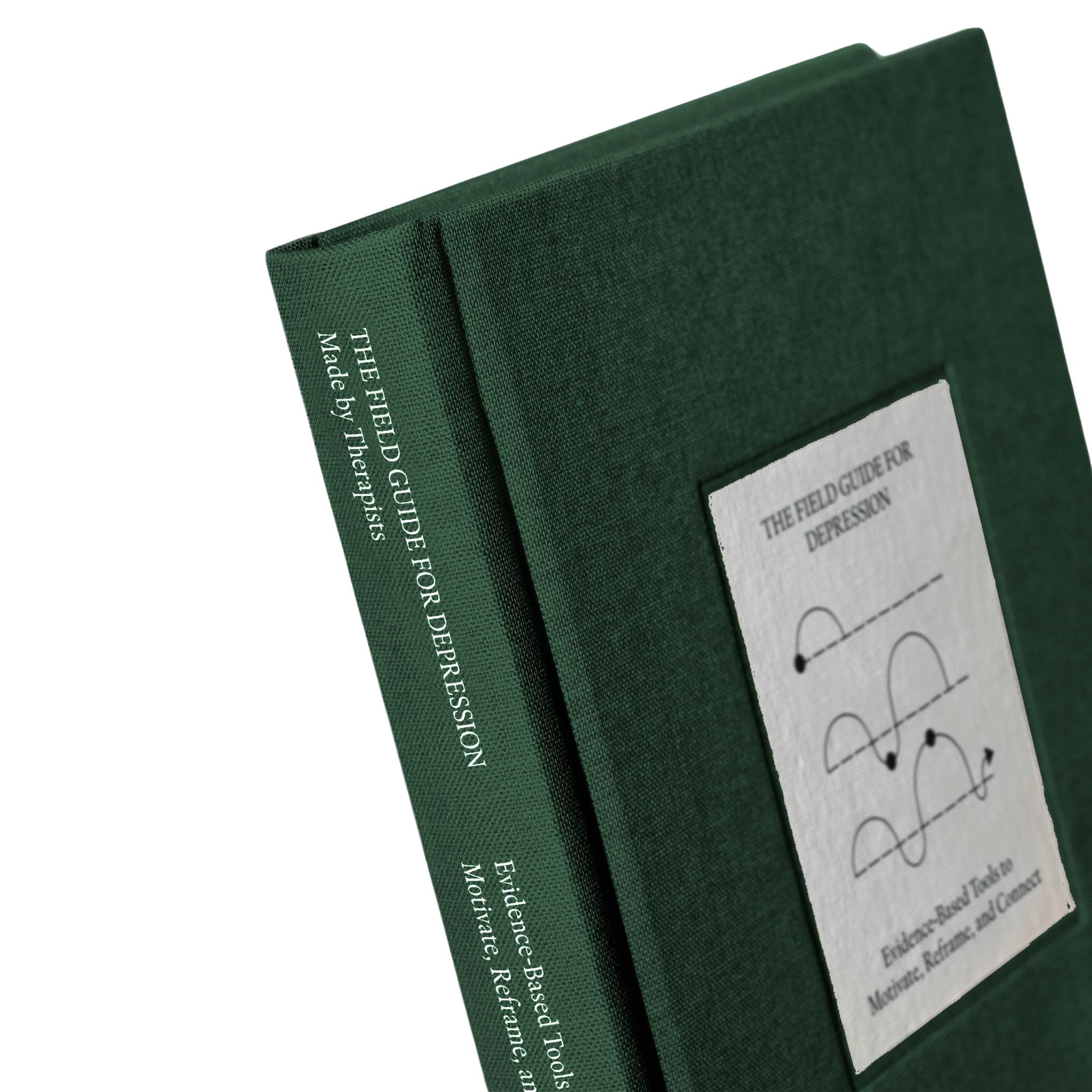 Close-up of The Field Guide for Depression by Therapy Notebooks, featuring a linen hardcover with a minimalist stitched patch and embossed spine text.