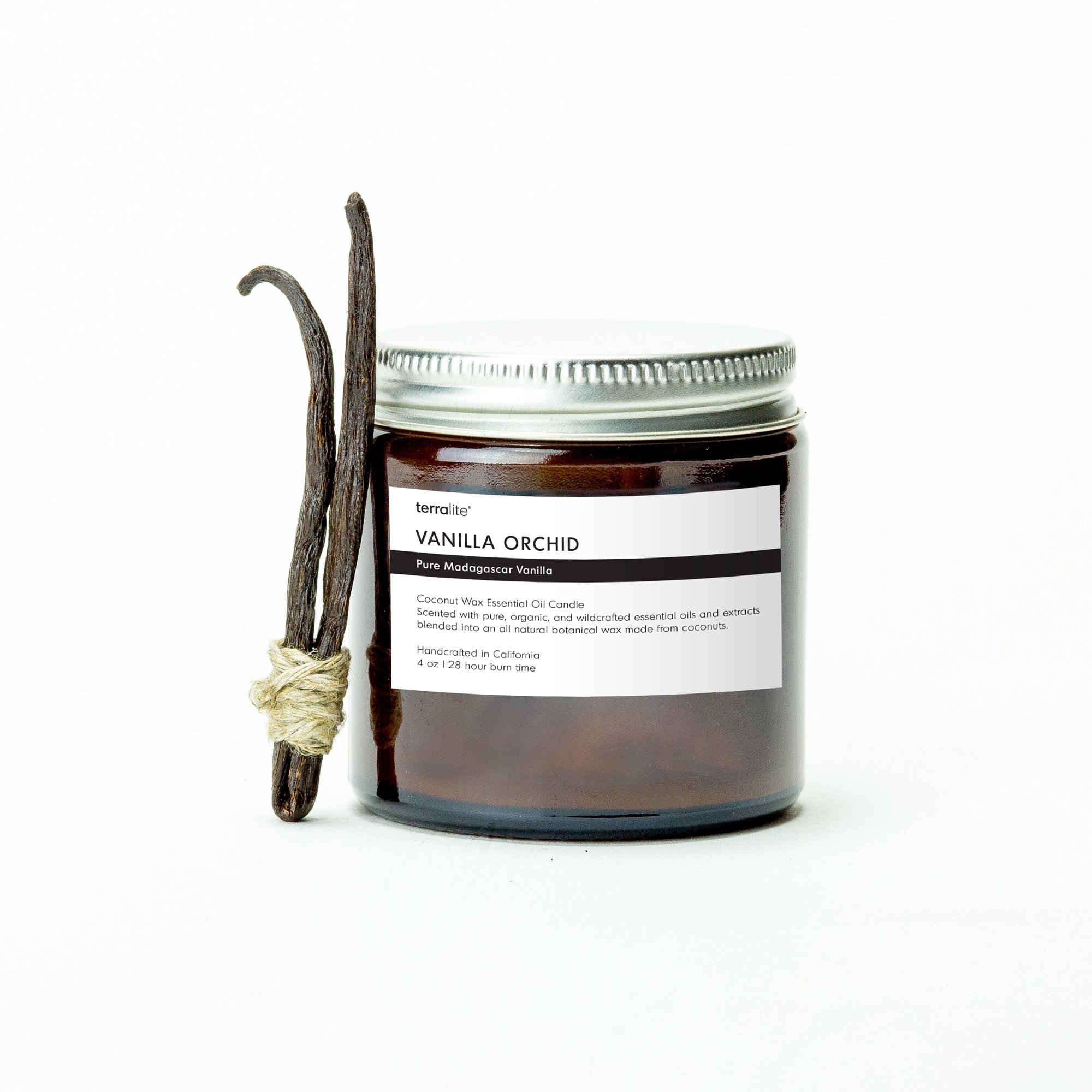 image of a jar of terralite scented candle vanilla scent with vanilla beans leaning against it