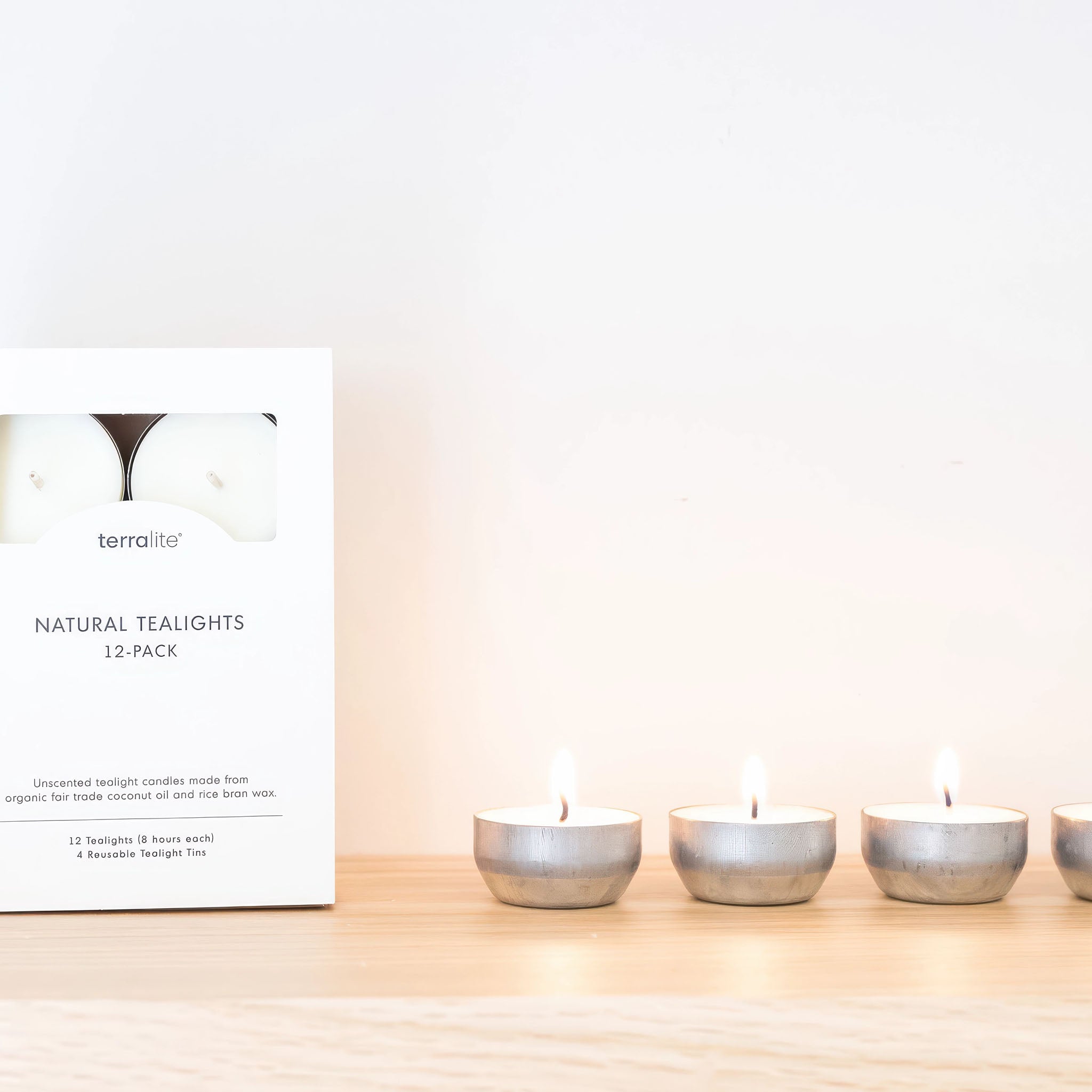 image of terralite tealights burning next to box