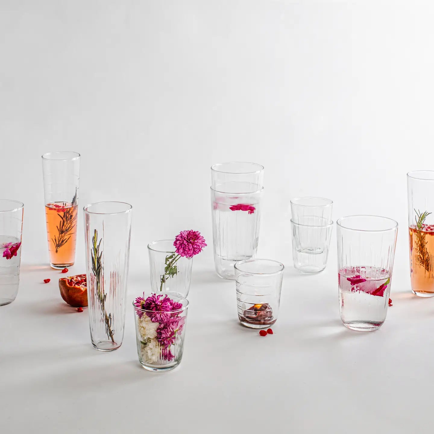 image of the collective flutes  surrounded by other glasswear