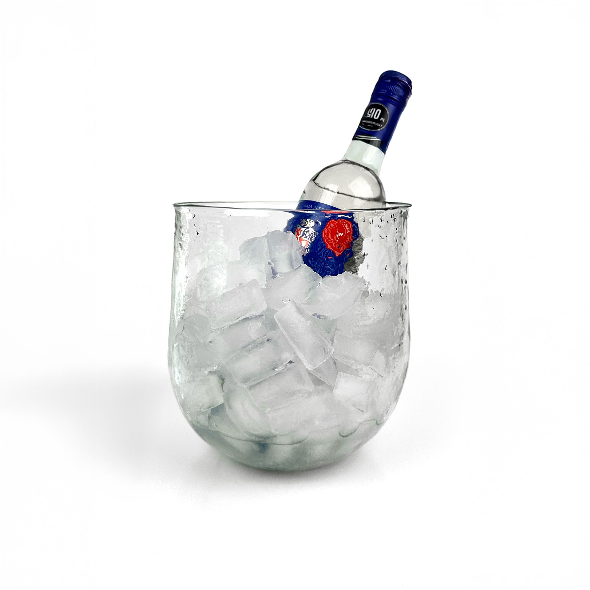 Glass ice bucket filled with ice and a vodka bottle, showcasing hammered texture and wide open top.