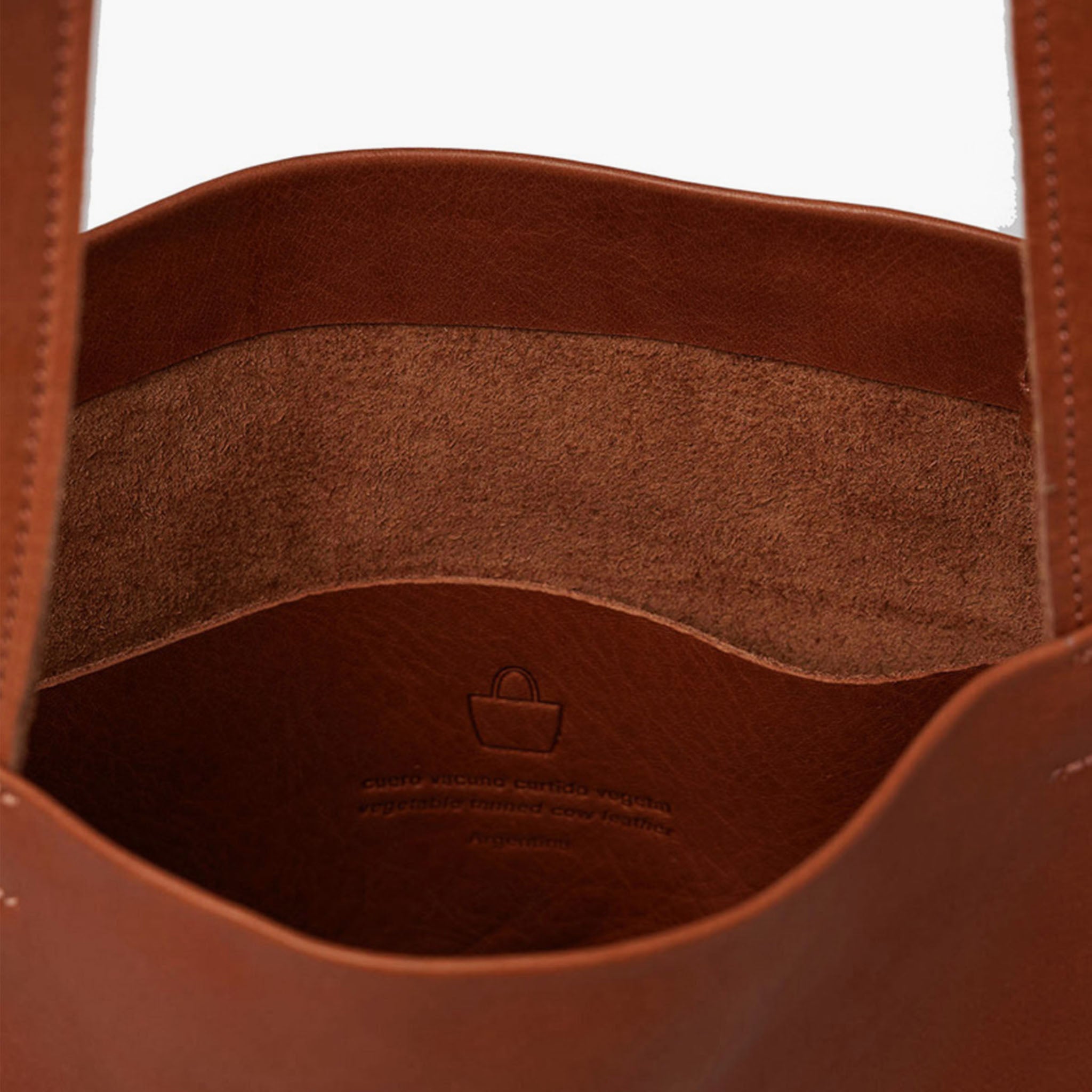 close up image of nimes mini freire tote tobacco color